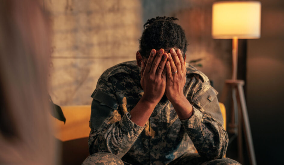 a soldier working through war trauma with a therapist