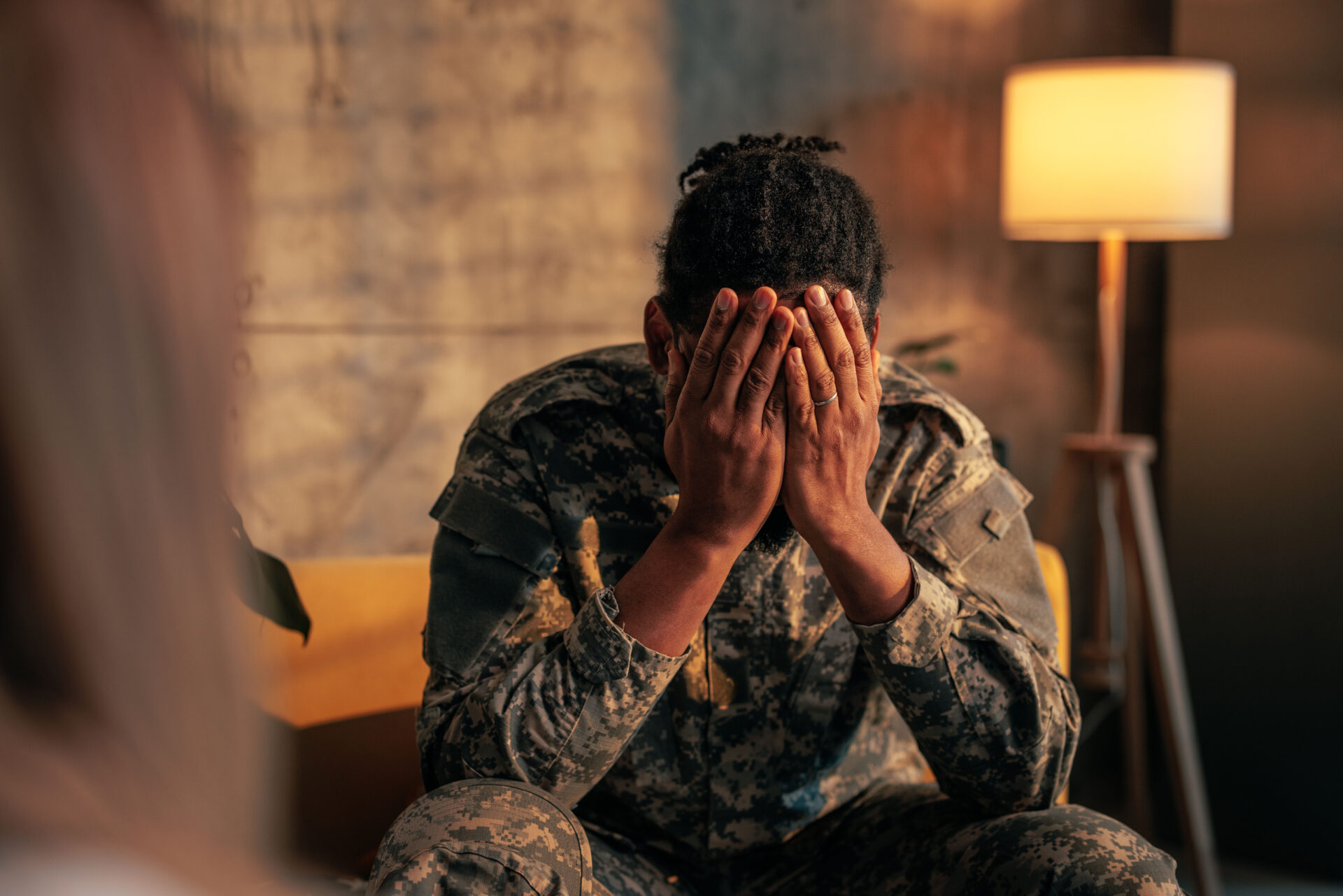 a soldier working through war trauma with a therapist