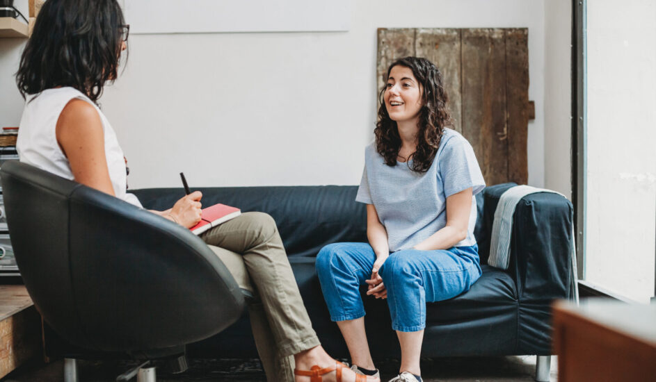 a woman talking to a therapist