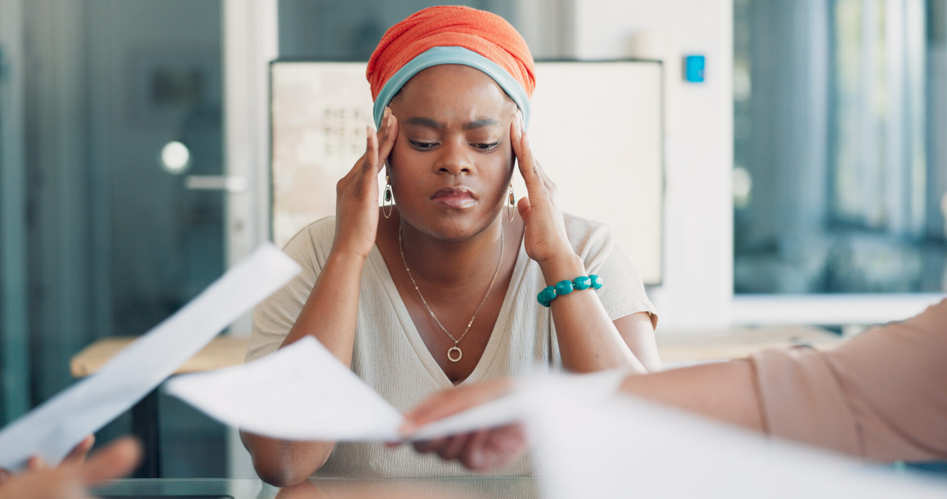 a woman struggling with cognitive distortions at work