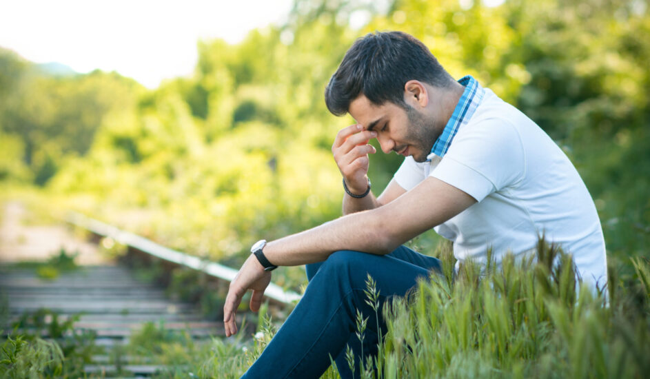 a young man experiencing summertime seasonal affective disorder